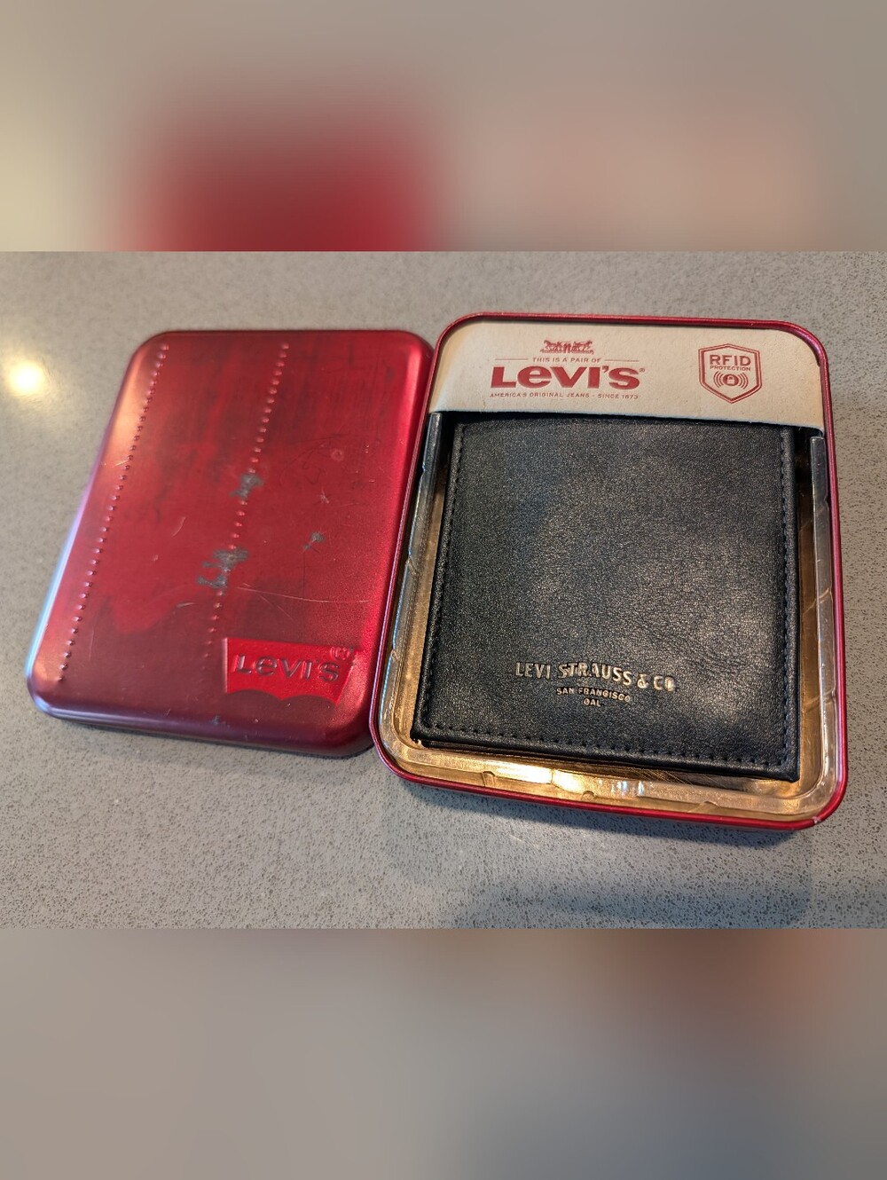 Levi's Black Leather Bifold Wallet with Red Tin Case